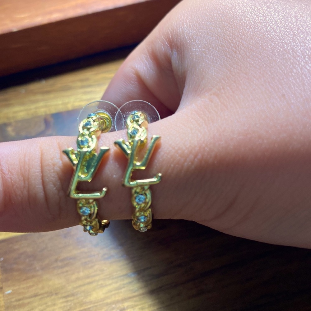 Beautiful half hoop earrings.